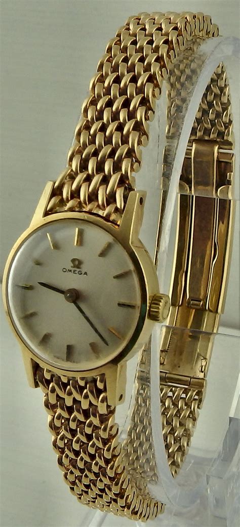 ladies 9ct solid gold omega wrist watch on 9ct omega bracelet working