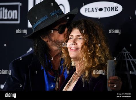 musician mike campbell left  wife marcie campbell attend   rock roll hall  fame