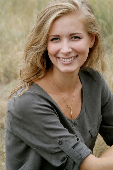 woman  black scoop neck shirt smiling  stock photo