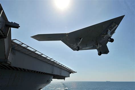 navys unmanned   jet lands  aircraft carrier    time video huffpost uk