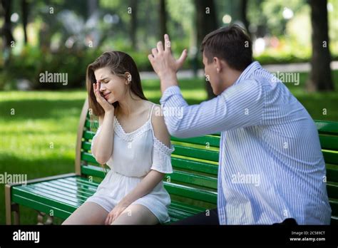 Domestic Violence Angry Husband Trying To Beat His Crying Wife At Park