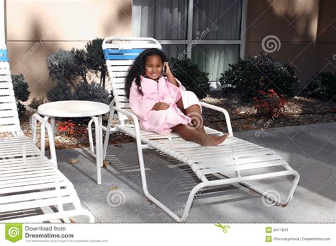 girl on deck lounge chair stock image image of deck rest