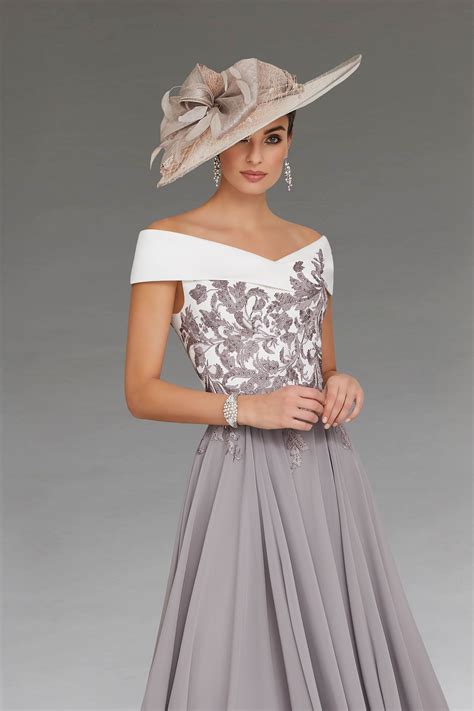 This Elegant Mid Length Dress Features A Flattering Wrap Effect Bardot
