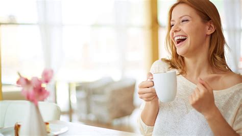 laughing woman drinking coffee  lakewood orthodontics duryea orthodontics