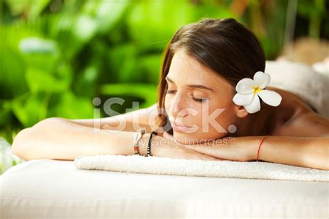 beautiful woman outdoor  spa massage stock photo royalty