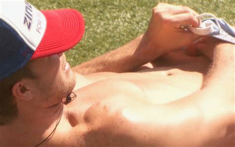 man candy us big brother s corey brooks gives a glimpse of the goods while sunbathing [nsfw