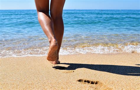 summer beach closeup  woman legs  sea stock photo  image