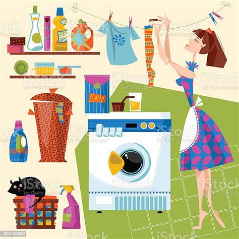 laundry room housewife hangs clean clothes after washing on line stock