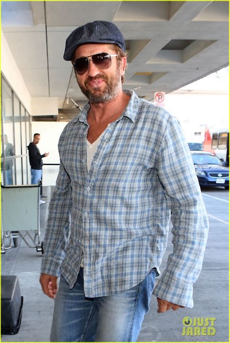 gerard butler takes the skies after halloween fun in los angeles photo