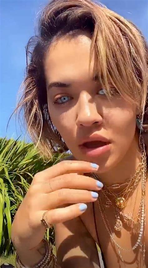 rita ora unleashes boobs in teeny string bikini for sun soaked exposé