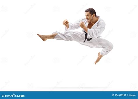 man performing flying kick  martial arts stock photo image  fight