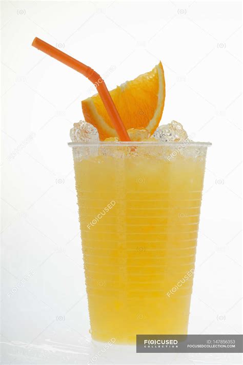 orange juice  crushed ice icecubes fruit juice stock photo