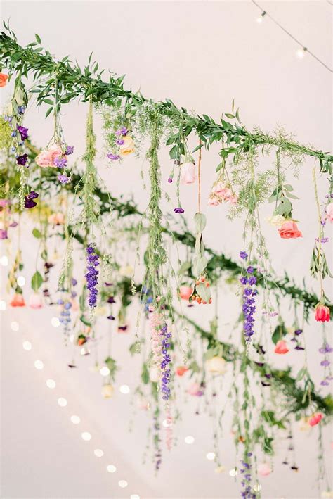 hanging wedding flowers  whimsical garden wedding carly mark