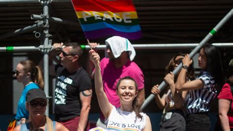 crowds gather as massive pride parade takes over downtown toronto