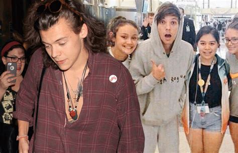 Harry Styles And Louis Tomlinson Arrive At Lax Airport Ahead Of One