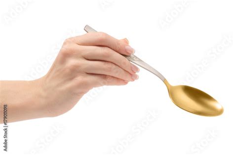 female hand holding  spoon stock photo  royalty  images