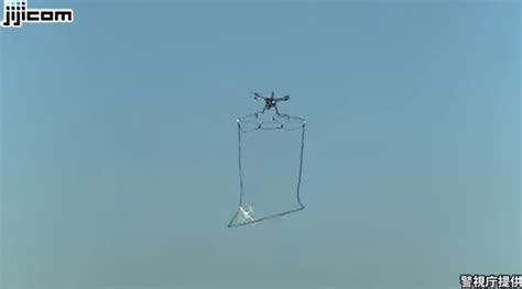 japan police   large drones  nets  catch  drones technology news