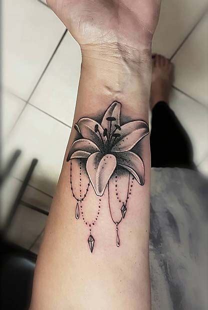 pretty lily tattoo ideas  women page    stayglam lillies tattoo lily tattoo