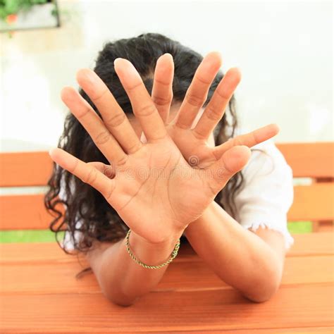 girl hiding hands stock image image  girl mouth smile