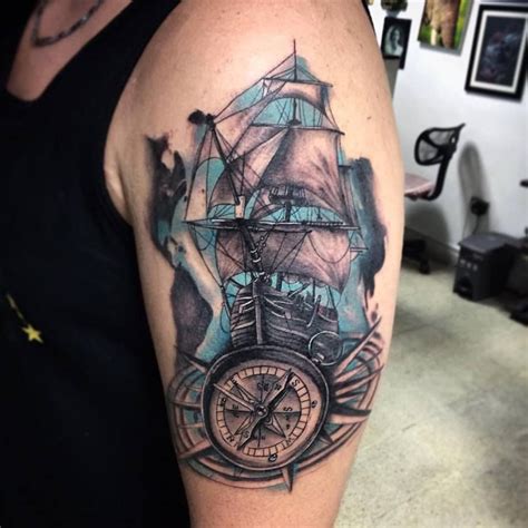 nautical compass and ship tattoo on left half sleeve 960x960 jpeg