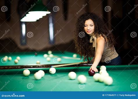 beautiful girl playing billiards stock image image of player