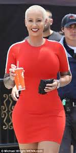 Amber Rose Highlights Her Curves In A Tight Mini Dress To Promote Her