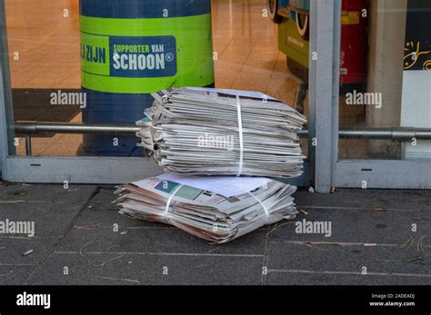 delivering newspapers   ah supermarket amsterdam  netherlands  stock photo alamy