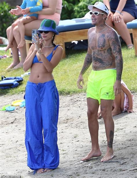 justin bieber smiles again after facial paralysis holidaying with