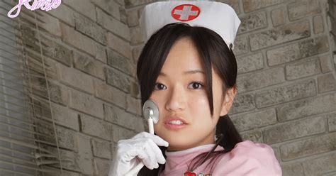 mayumi yamanaka japanese cute idol sexy nurse pink uniform fashion photo shoot on the arm chair