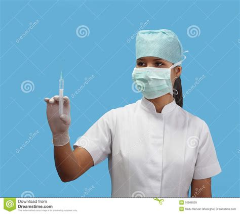 Female Nurse Holding A Syringe Stock Image Image Of
