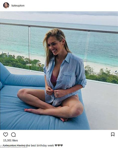 kate upton goes topless in risque snap as she put on