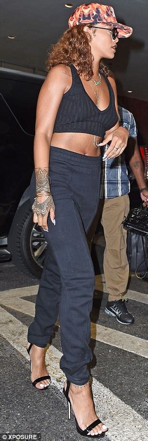 rihanna oozes sex appeal as she shows off her toned midriff in nyc
