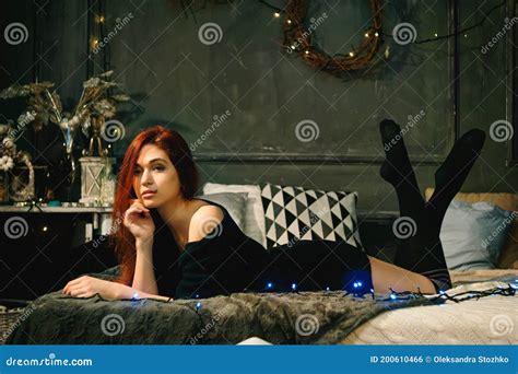 Redhead Woman Stay At Cozy Home Alone To Celebrate New Year And Lying