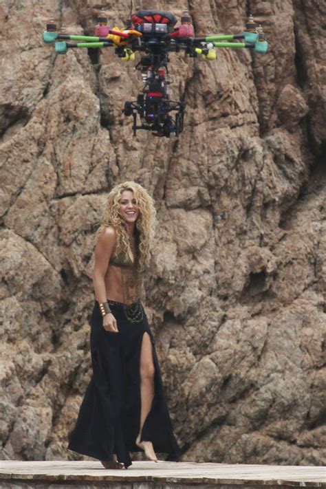 shakira flaunts her sizzling figure in chainmail bikini as she films