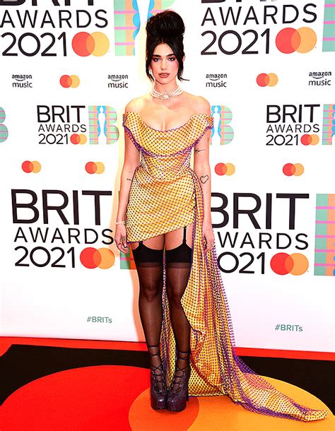 Dua Lipa Stuns At The 2021 Brit Awards In Retro Mini Dress