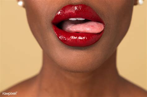 black woman sticking her tongue out premium image by