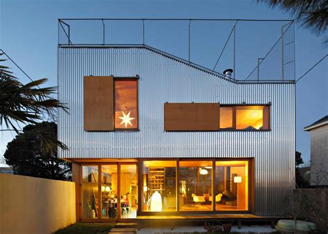 cool french house  corrugated aluminium facade  roof top terrace