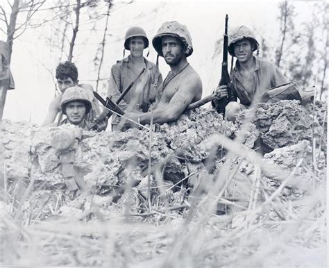 m165 marines in fox hole near front lines on saipan 1 july 1944 photo courtesy of nara