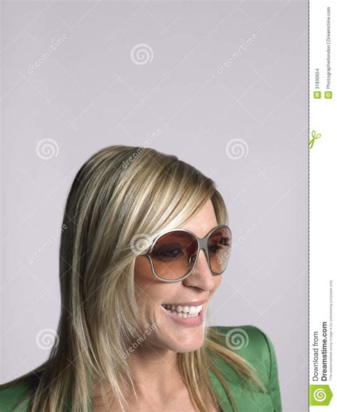 happy blonde woman wearing sunglasses stock images image 31830654