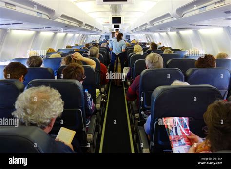 passengers   aeroplane interior  seating area  aircraft passengers  economy seats