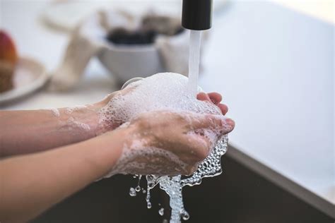 person washing  hand  stock photo