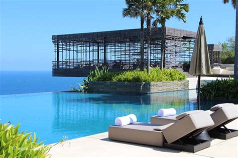 alila villas uluwatu   luxurious hotel  bali sand   suitcase