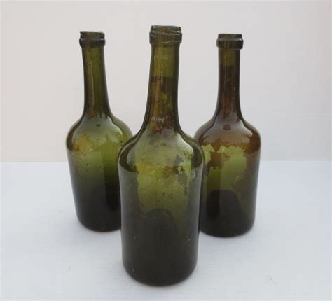 geveild bij catawiki een lot bestaande uit  handgeblazen wijnflessen met een diepe ziel