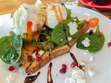 poached eggs on avocado on toast at two dudes kitchen in south yarra