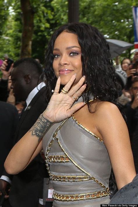 rihanna goes braless in paris after sporting see through