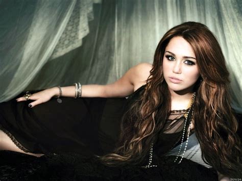 Miley Cyrus Chestnut Colour Side Swept Bangs Curls