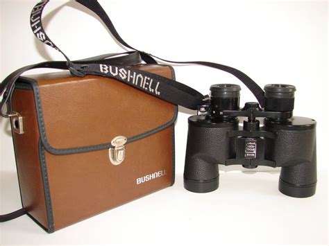 bushnell insta focus zoom binoculars  brown carrying case    power mm