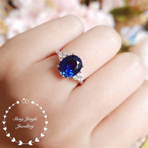 genuine lab grown royal blue oval sapphire engagement ring  carats