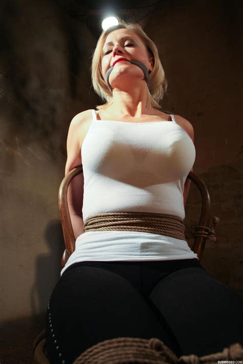 busty victoria tied to a chair with her big tits exposed in steamy bdsm sex