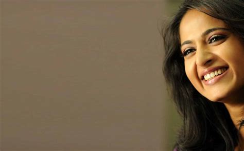 high definition anushka shetty close up face smile hd wallpapers wallpapers and backgrounds